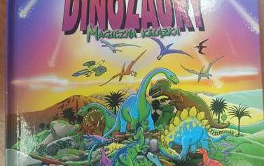 Okładka tytułowa książki "Dinozaury - magiczna książka"